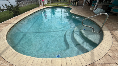 Before and after phosphate removal showing clean pool water in Charlotte County - After